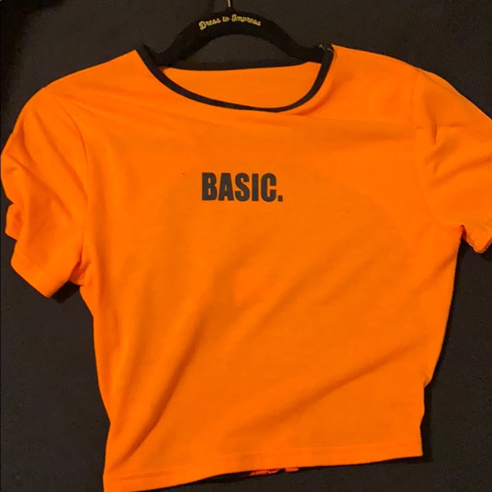 Bright orange top